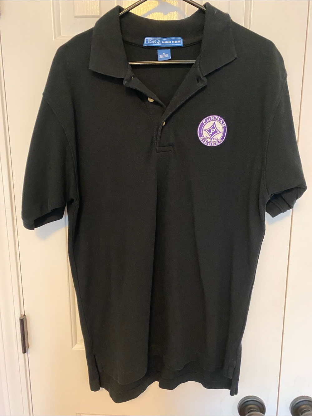 Black Polo Shirt with Purple Emblem Furman Singers